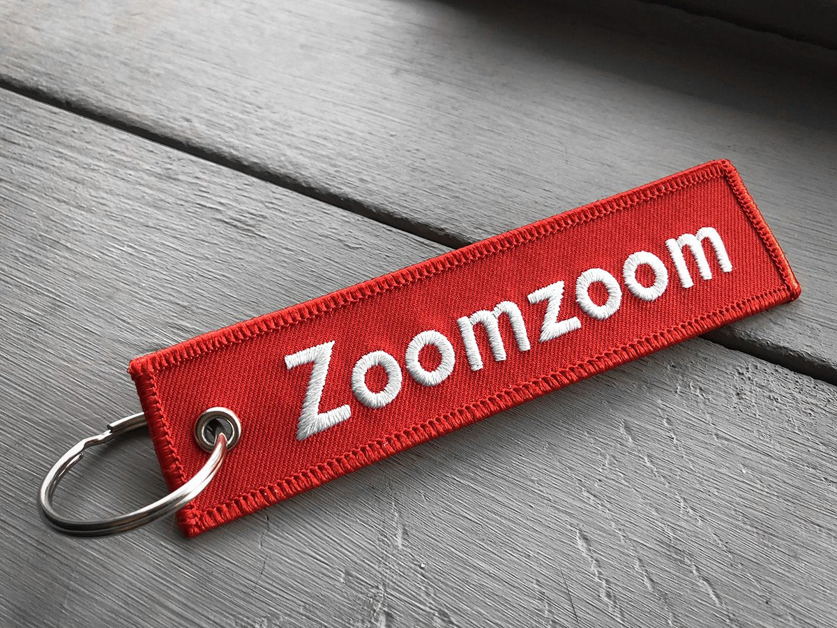zoom zoom jet tag keychain key chain